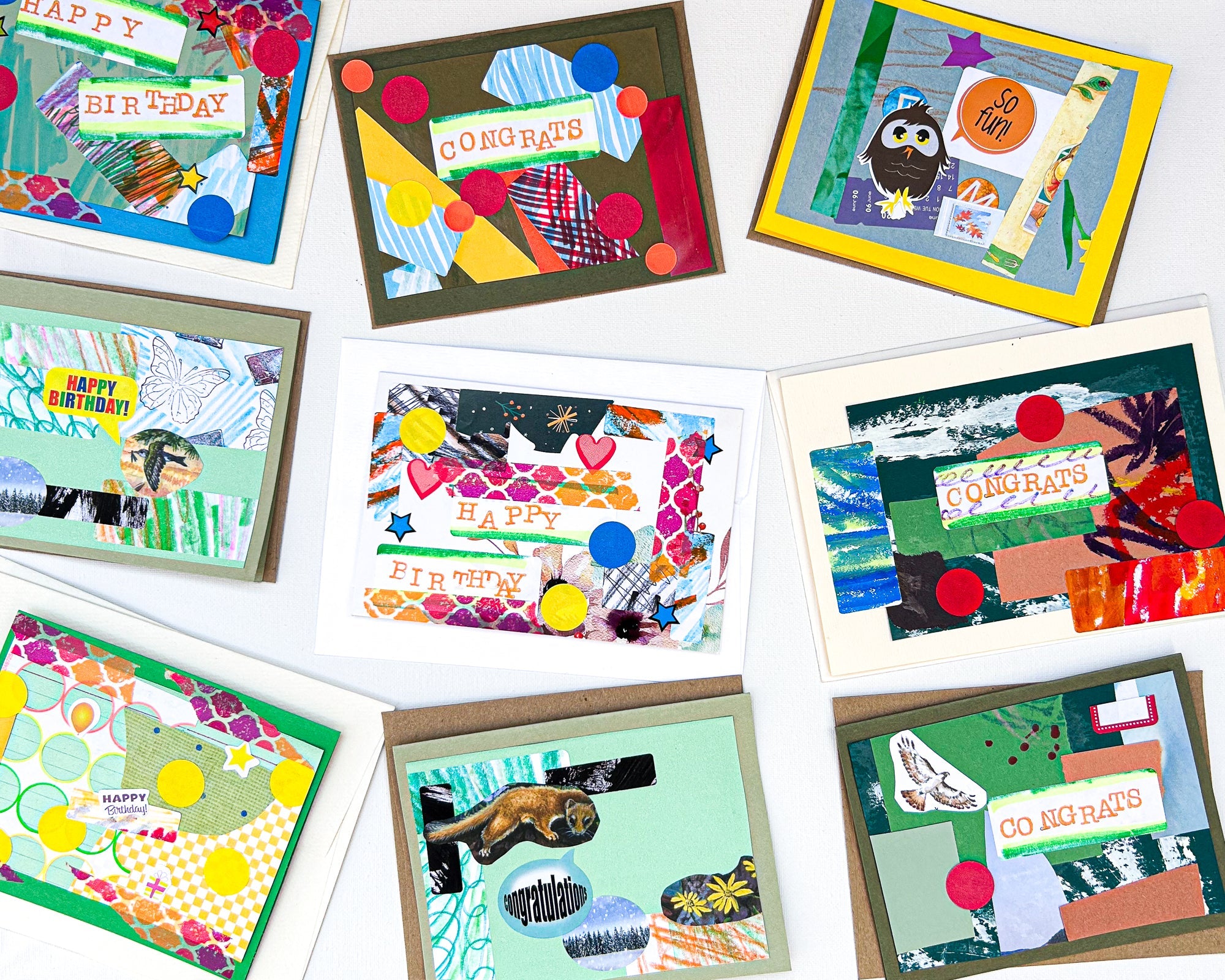 Collection of colorful greeting cards with various designs on a white background