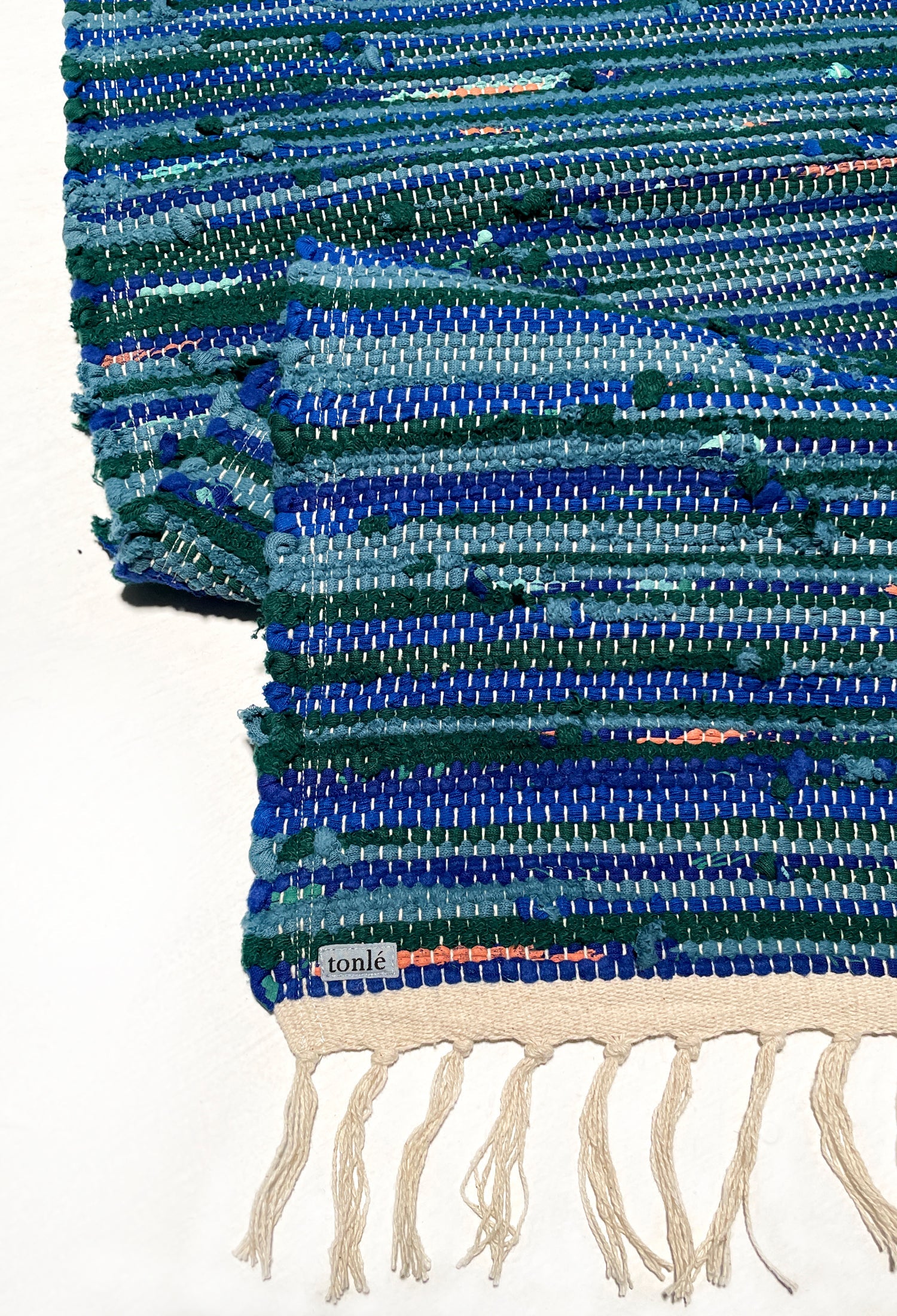 nimol handwoven rug with ties - navy and blue tones