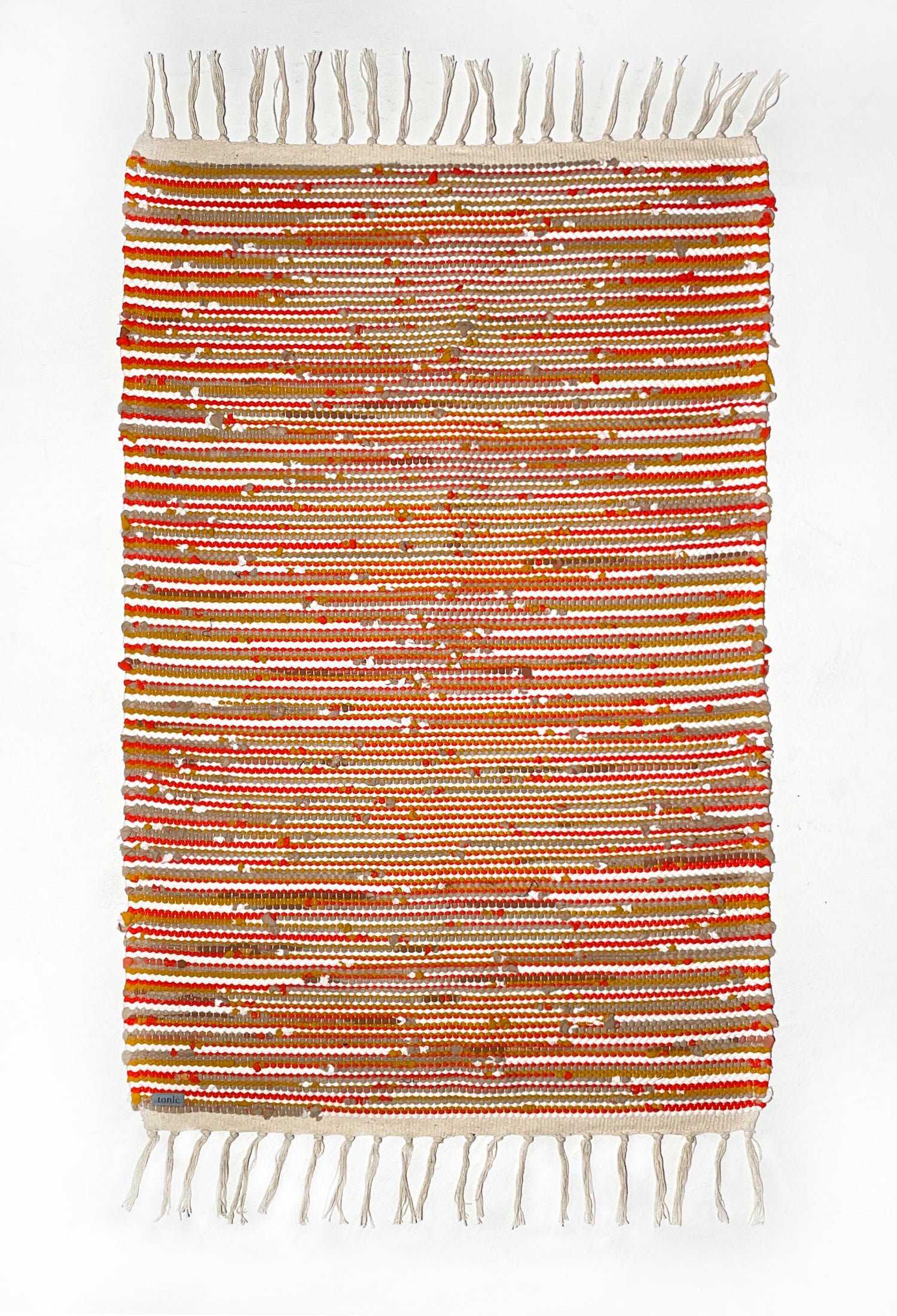 nimol handwoven rug with ties - crimson tones