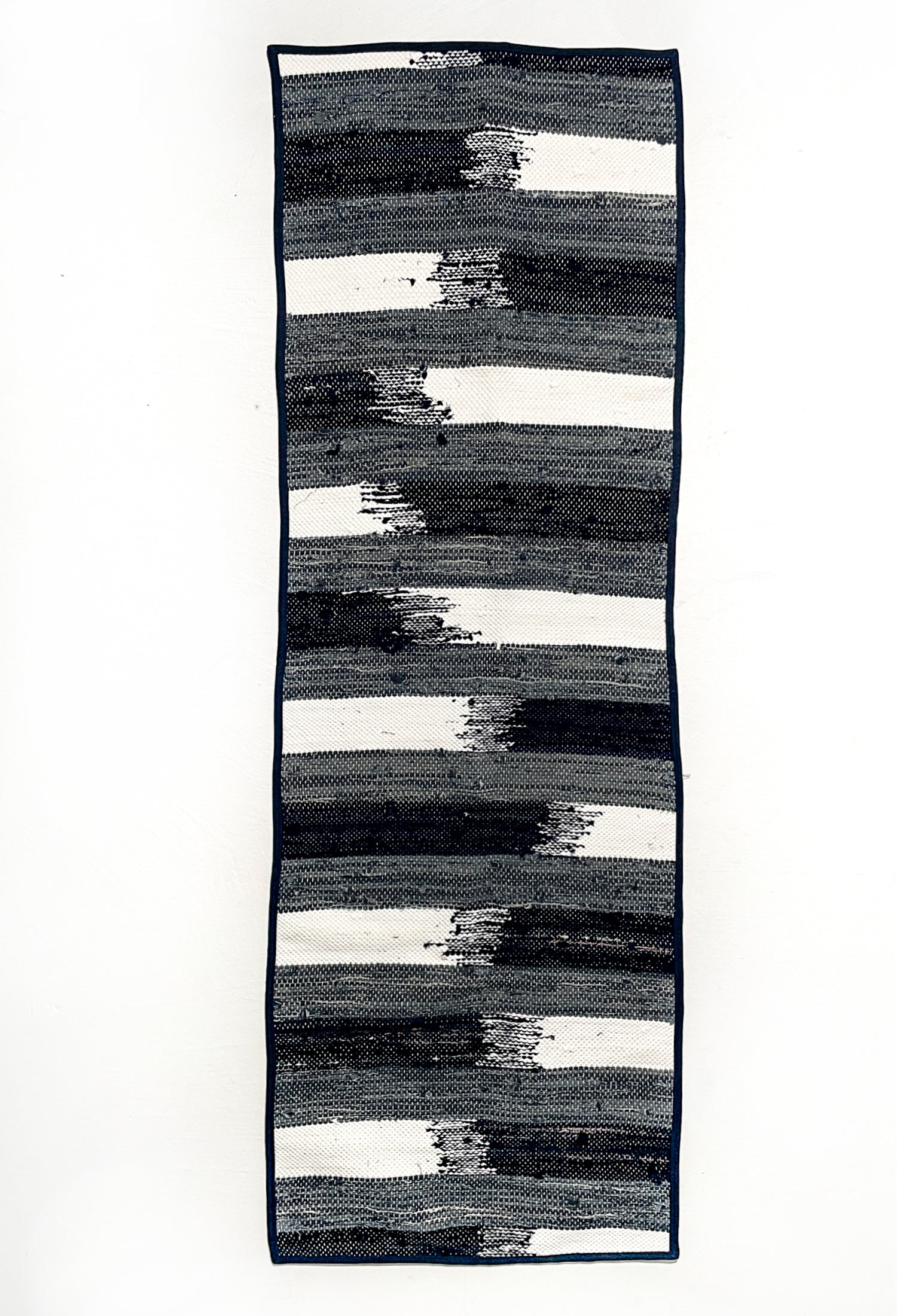 piseth handwoven rug - navy and blue tones