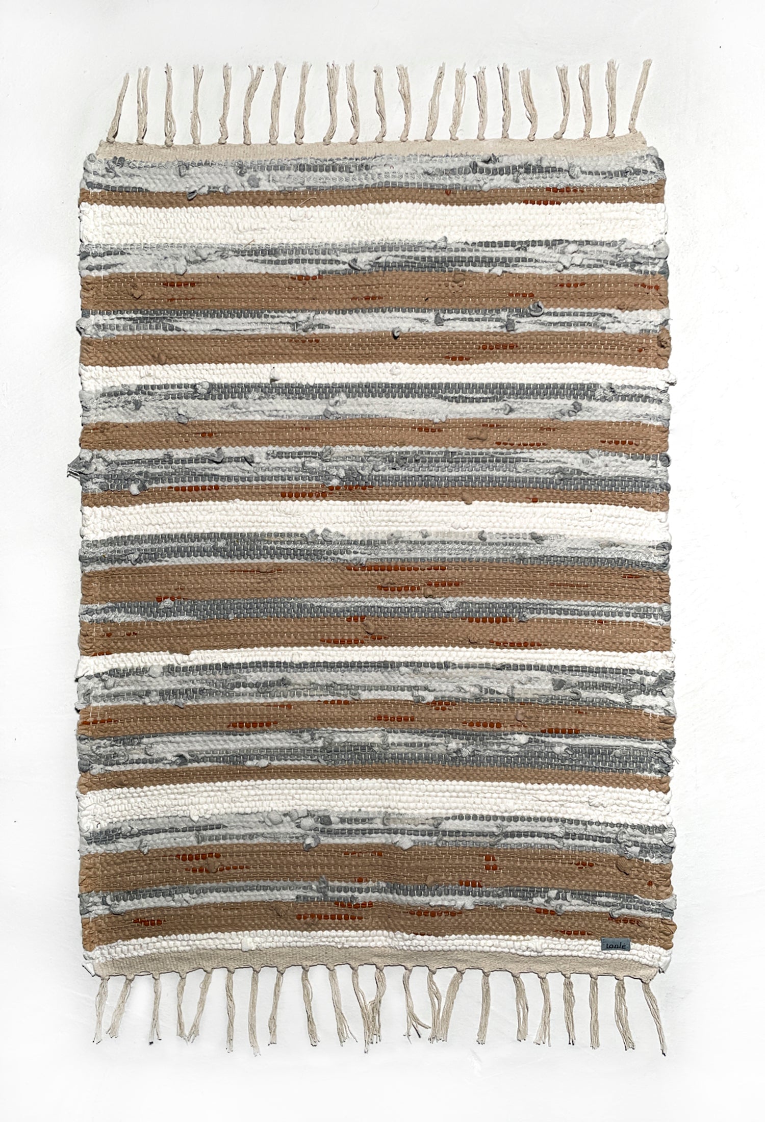 nimol handwoven rug with ties - natural tones