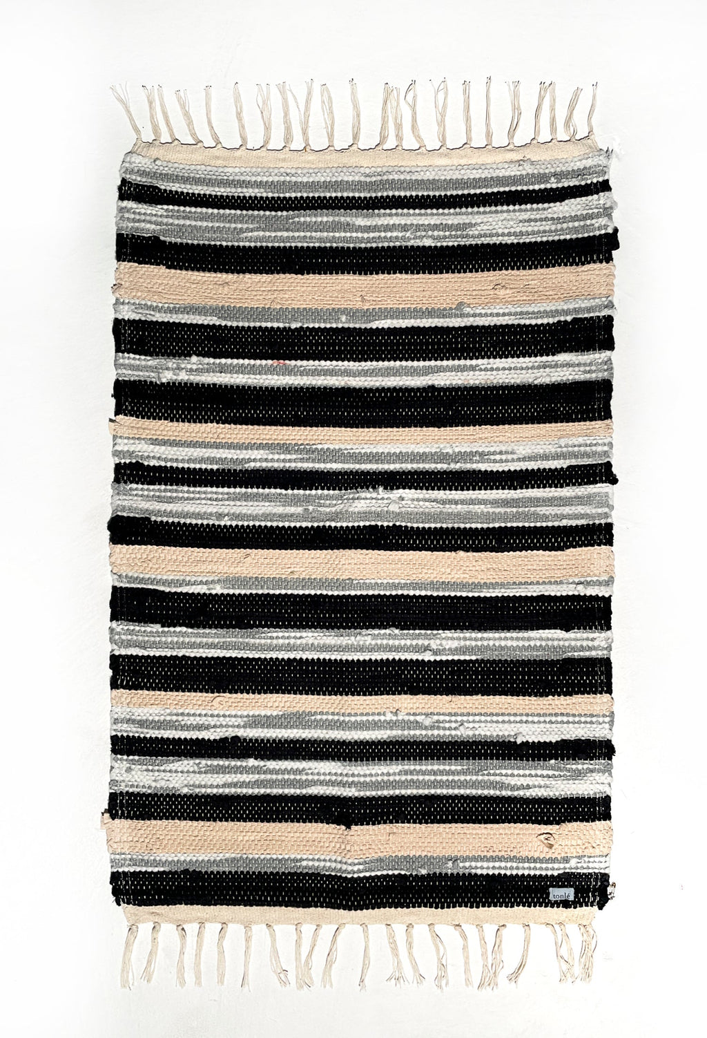 nimol handwoven rug with ties - black and white tones