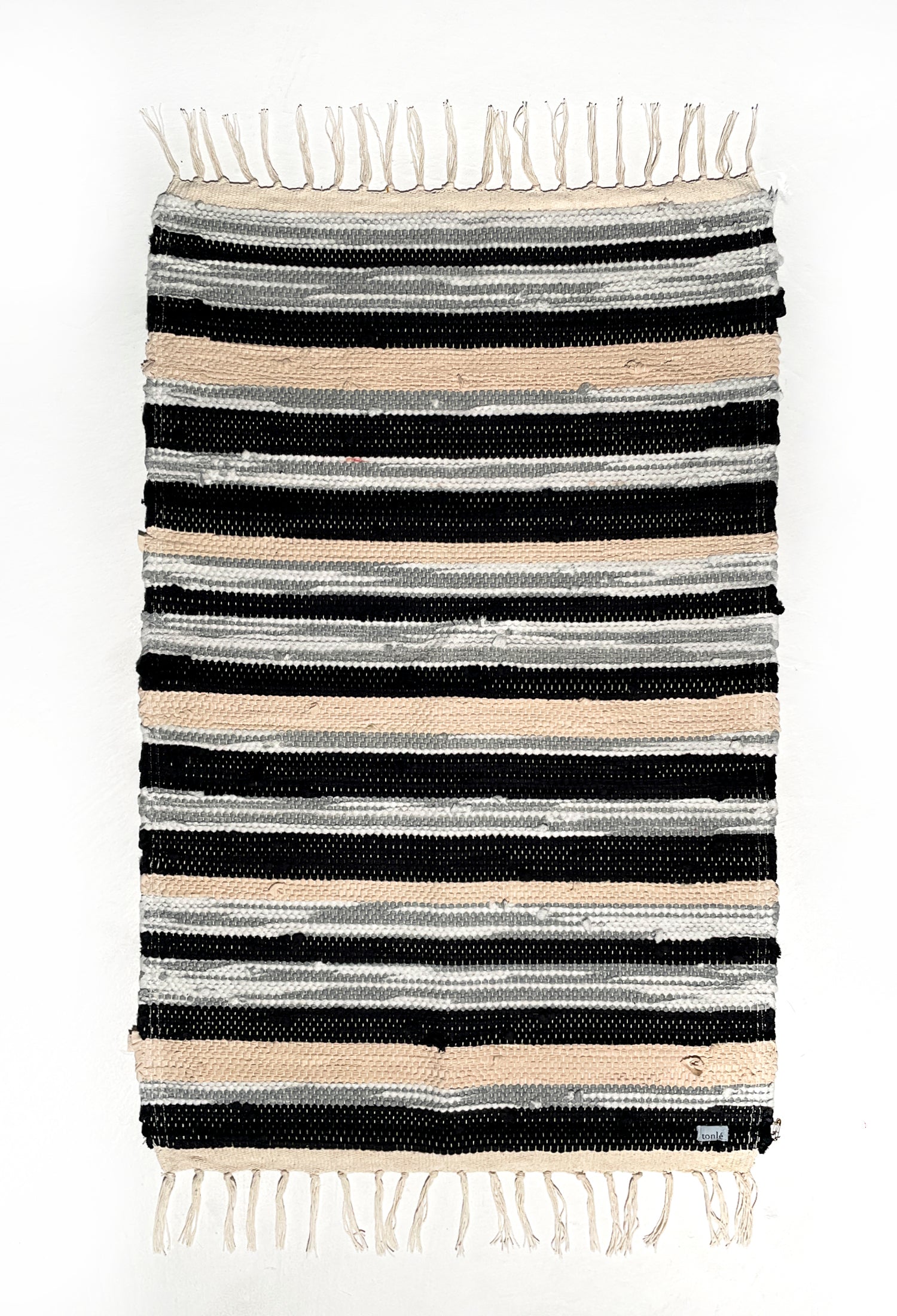 nimol handwoven rug with ties - black and white tones