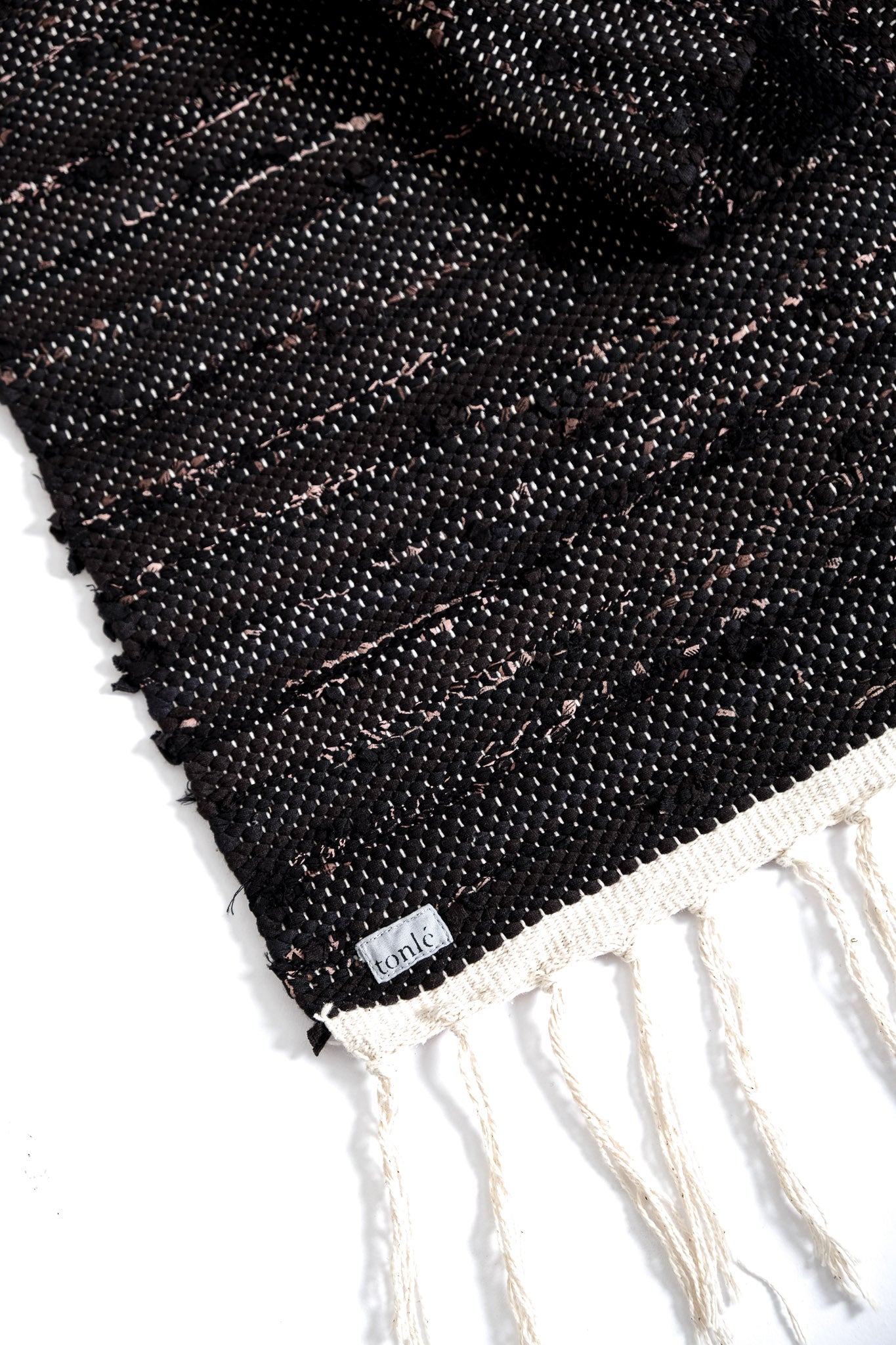 nimol handwoven rug with ties - black and white tones