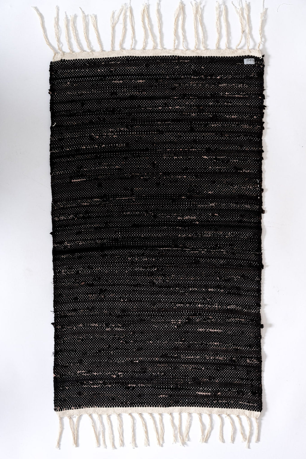 nimol handwoven rug with ties - black and white tones