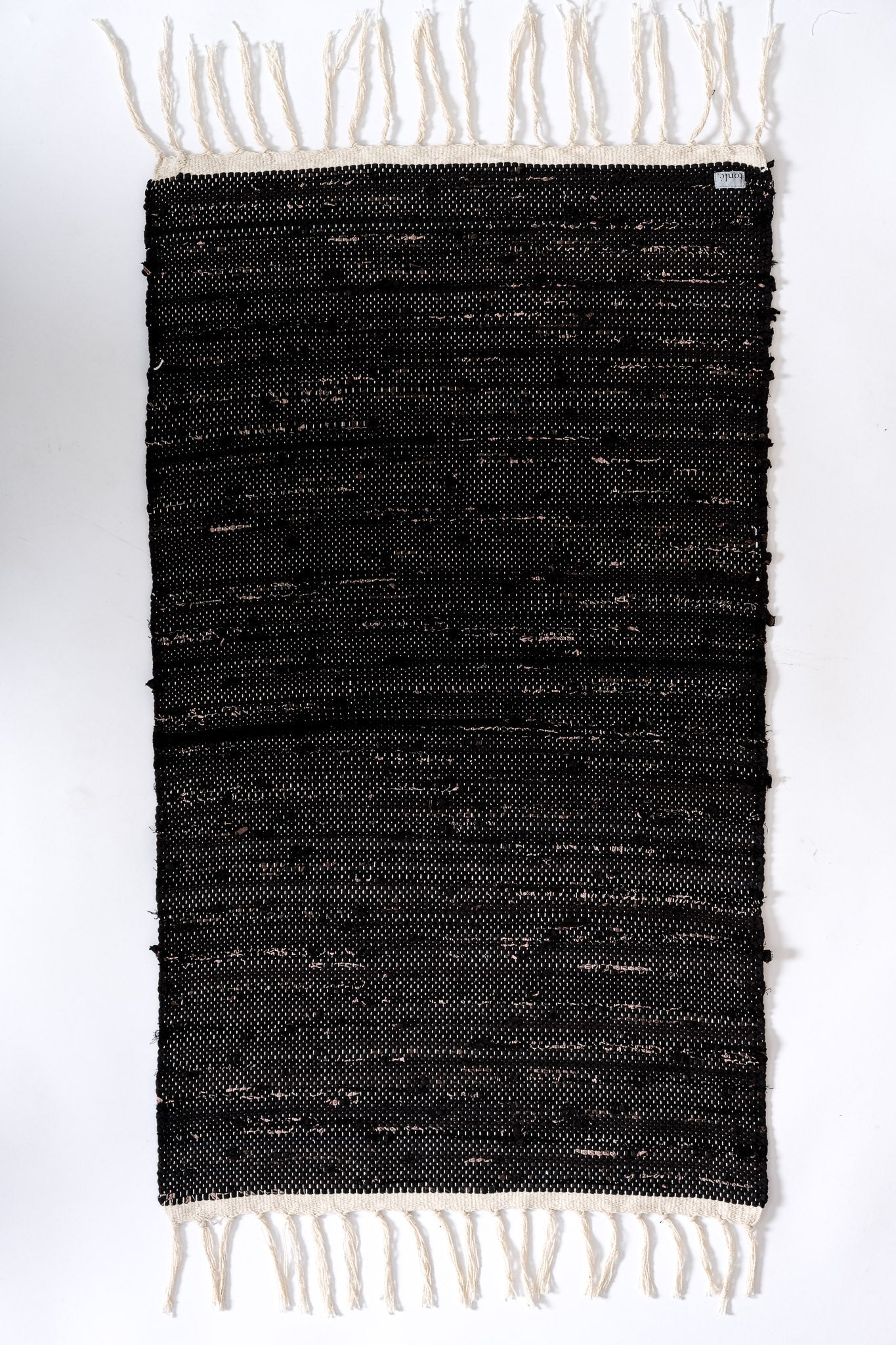 nimol handwoven rug with ties - black and white tones