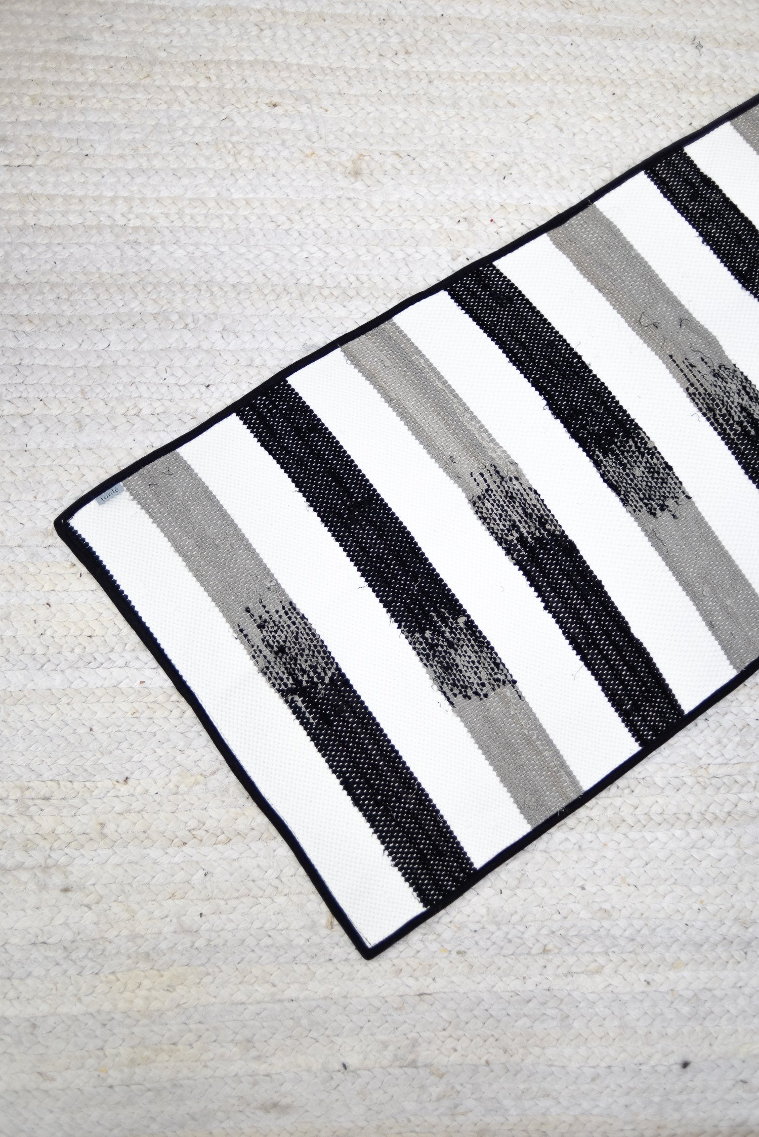 piseth handwoven rug - black and white tones