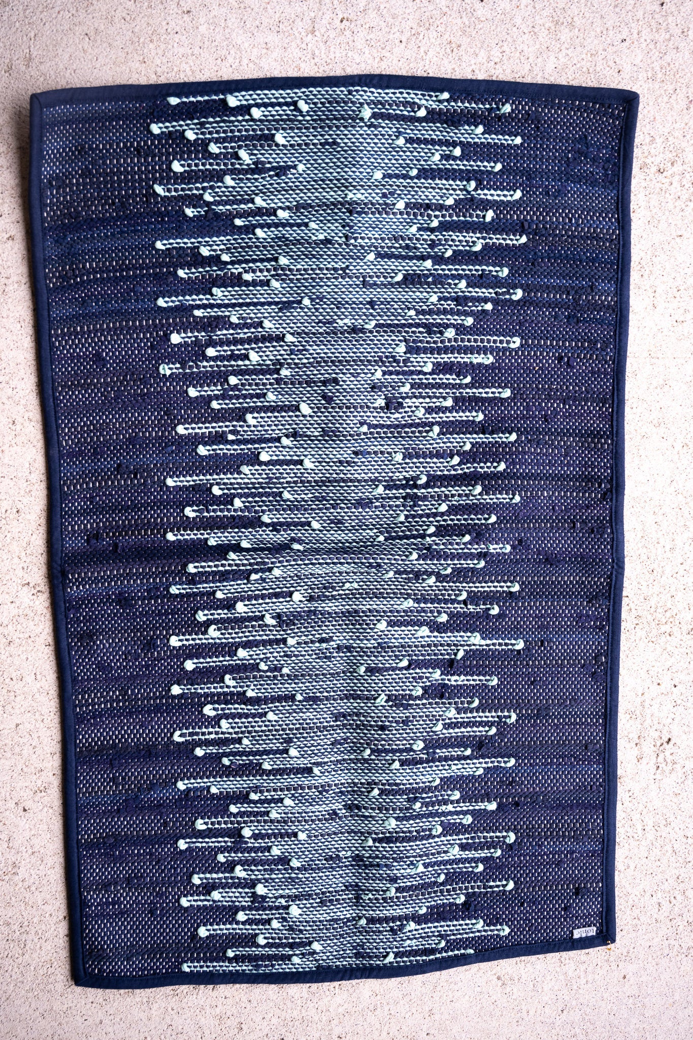 piseth handwoven rug - navy and blue tones