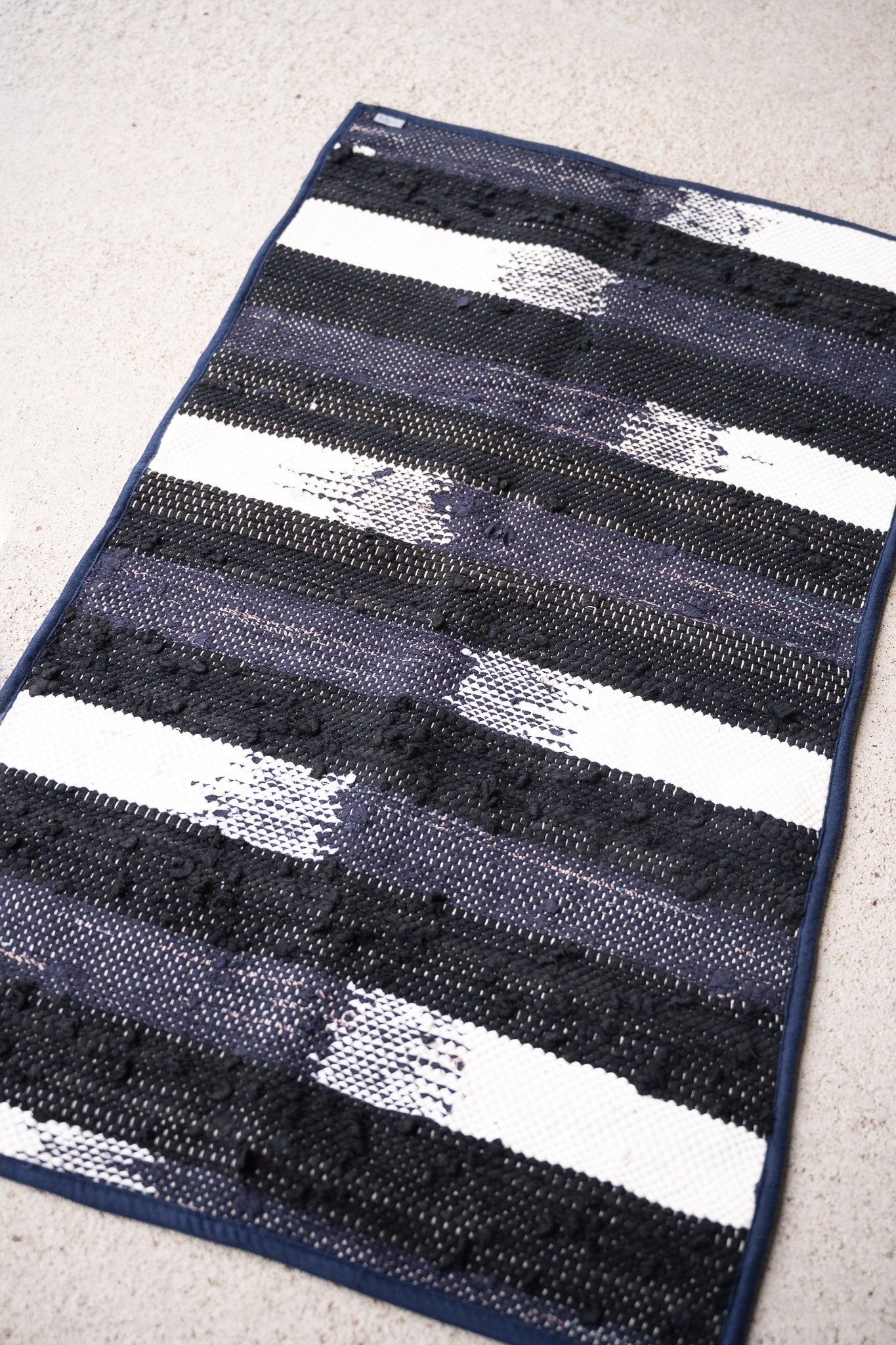 piseth handwoven rug - navy and blue tones