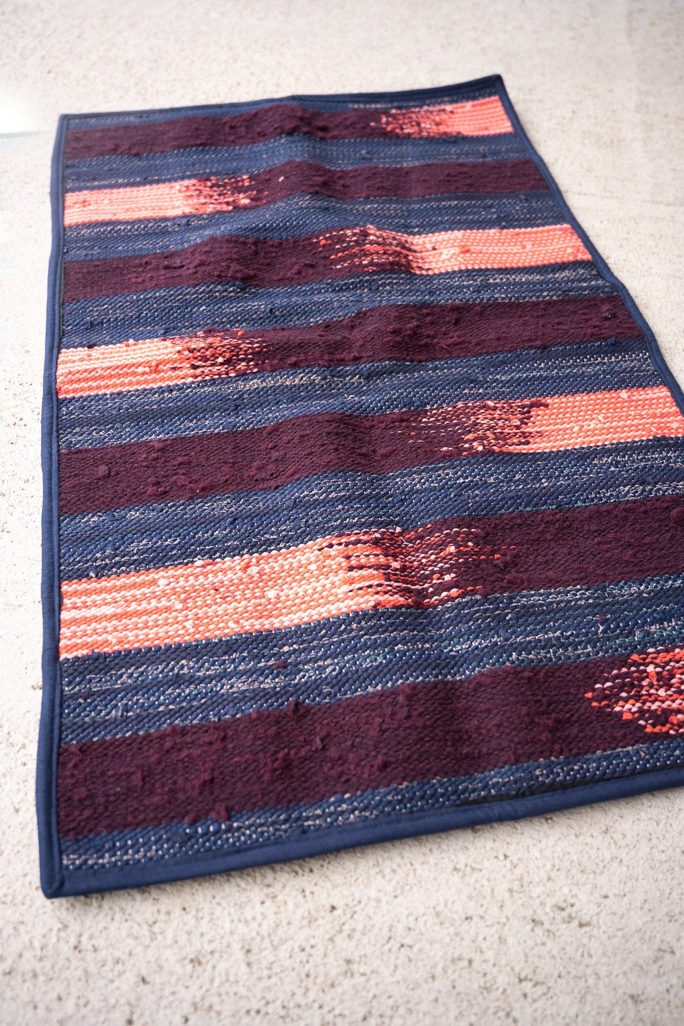 piseth handwoven rug - navy and blue tones