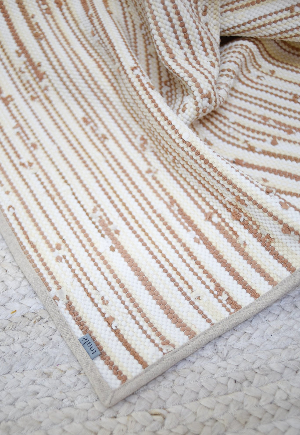 piseth handwoven rug - natural tones