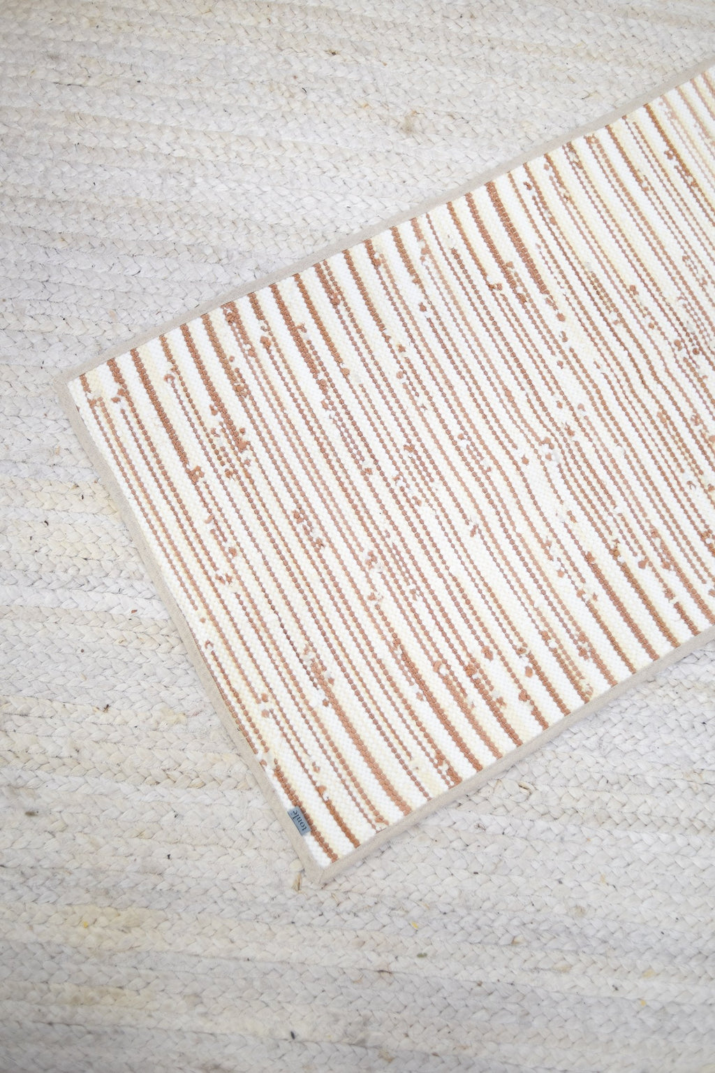 piseth handwoven rug - natural tones