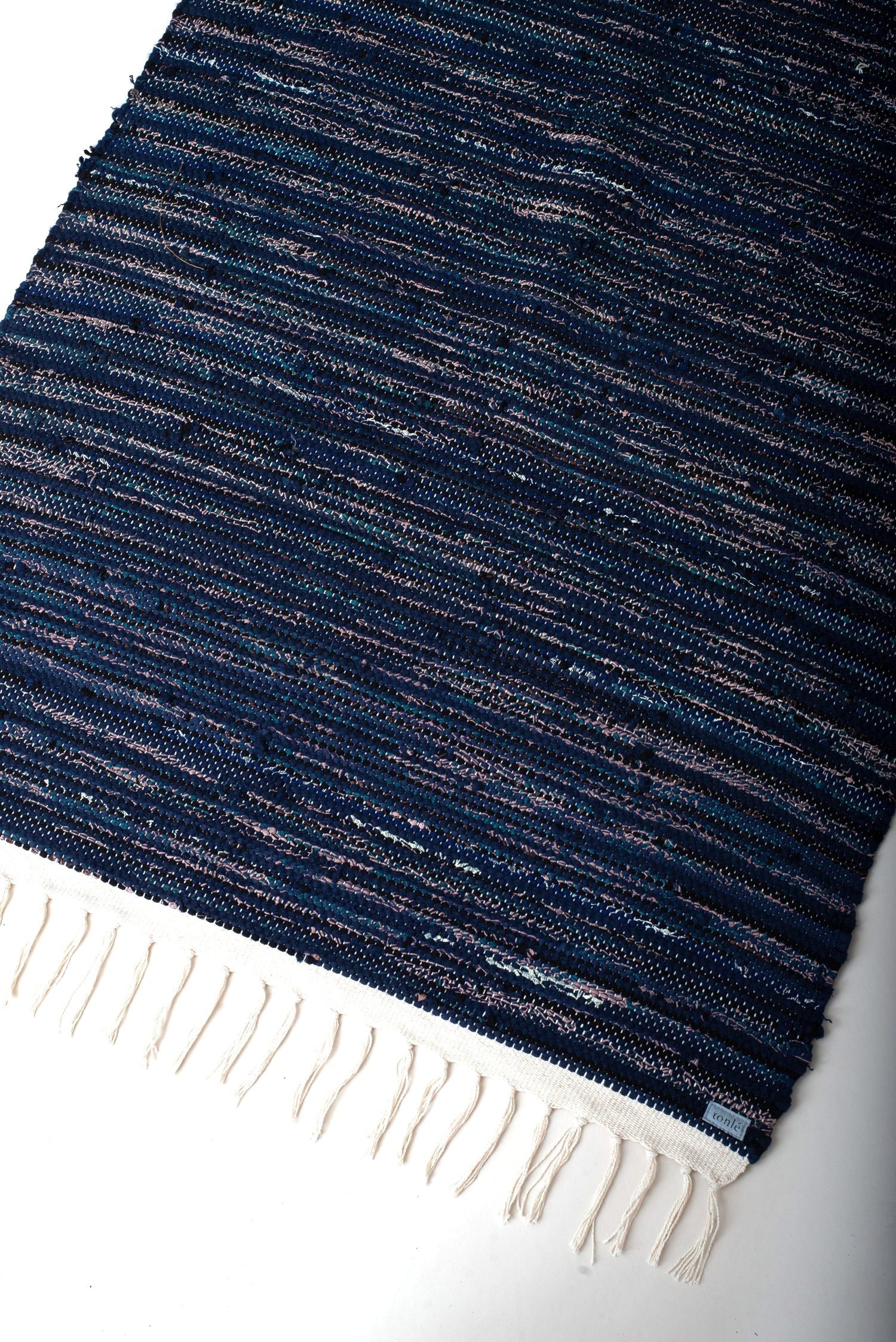 nimol handwoven rug with ties - navy and blue tones