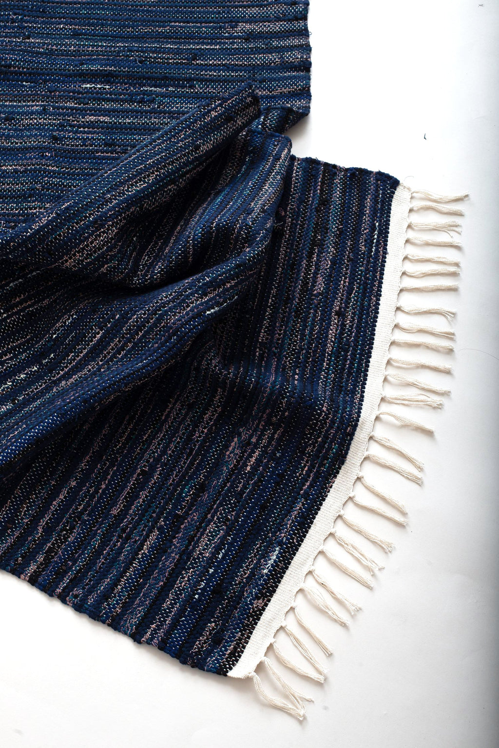 nimol handwoven rug with ties - navy and blue tones