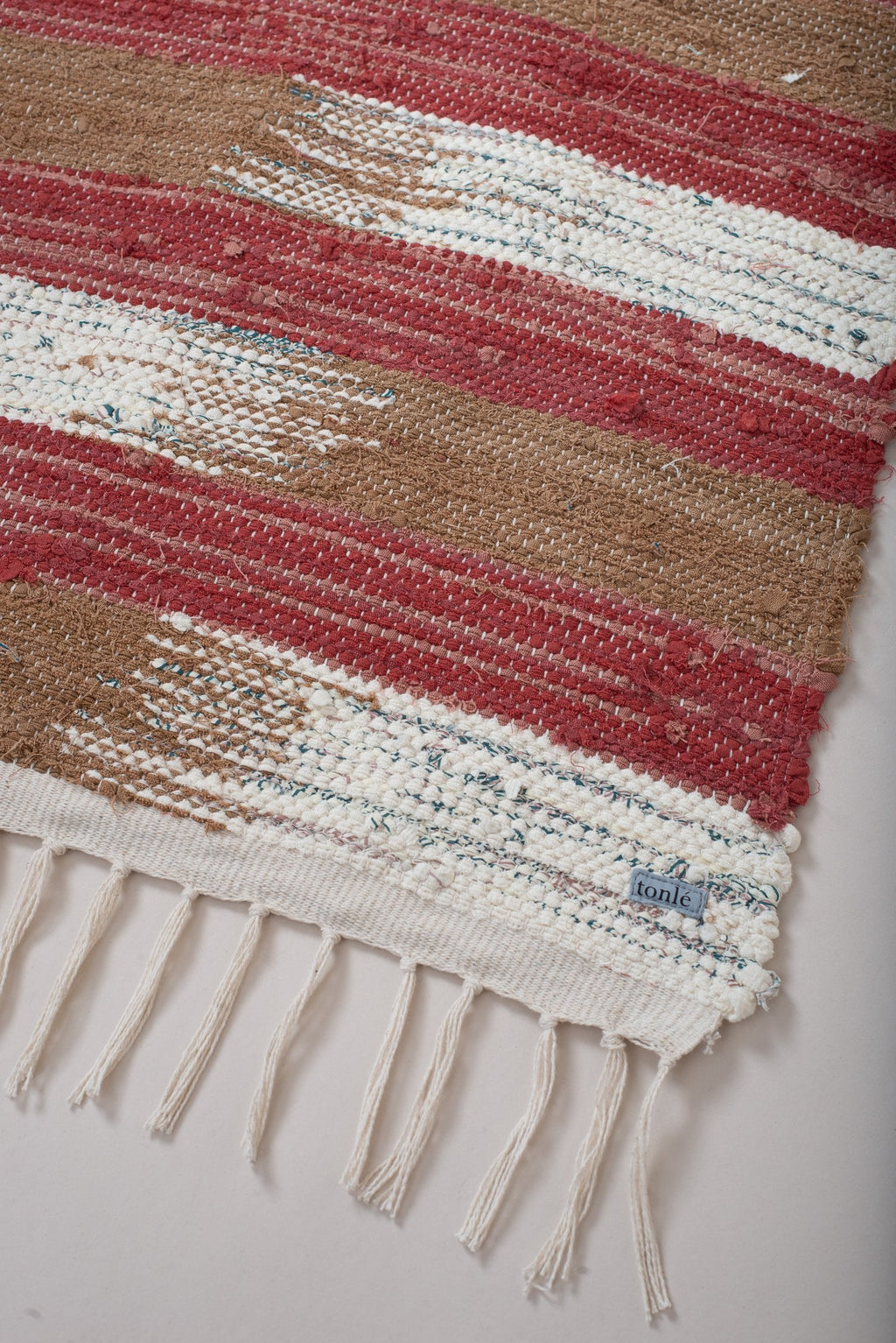 nimol handwoven rug with ties - natural tones