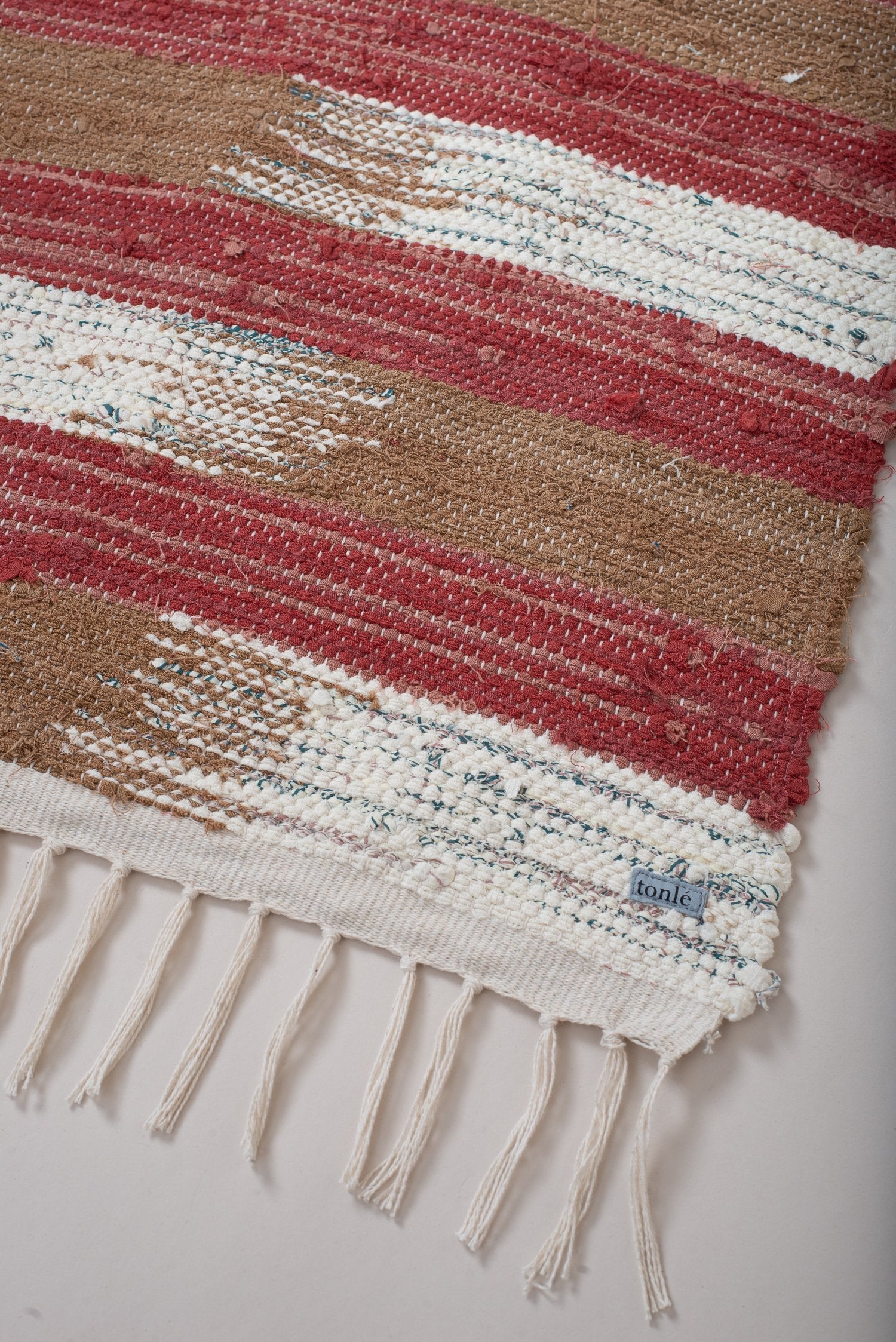 nimol handwoven rug with ties - natural tones