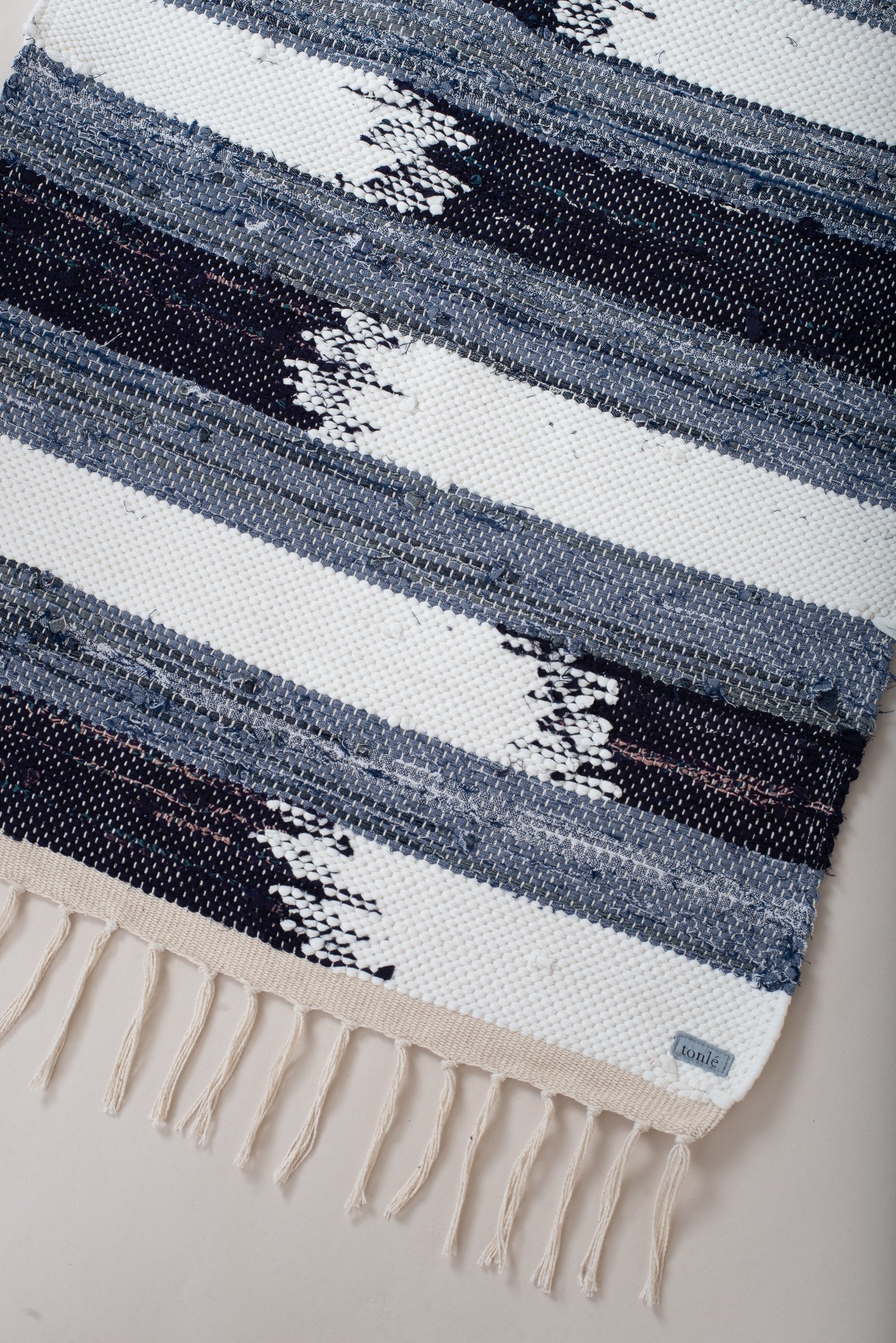 nimol handwoven rug with ties - navy and blue tones