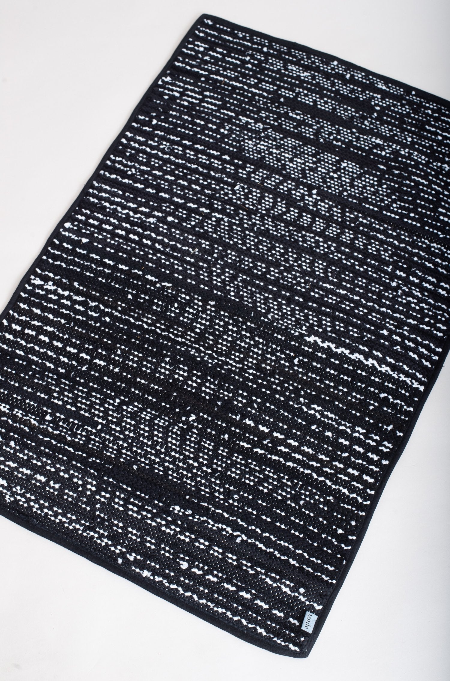 piseth handwoven rug - black and white tones