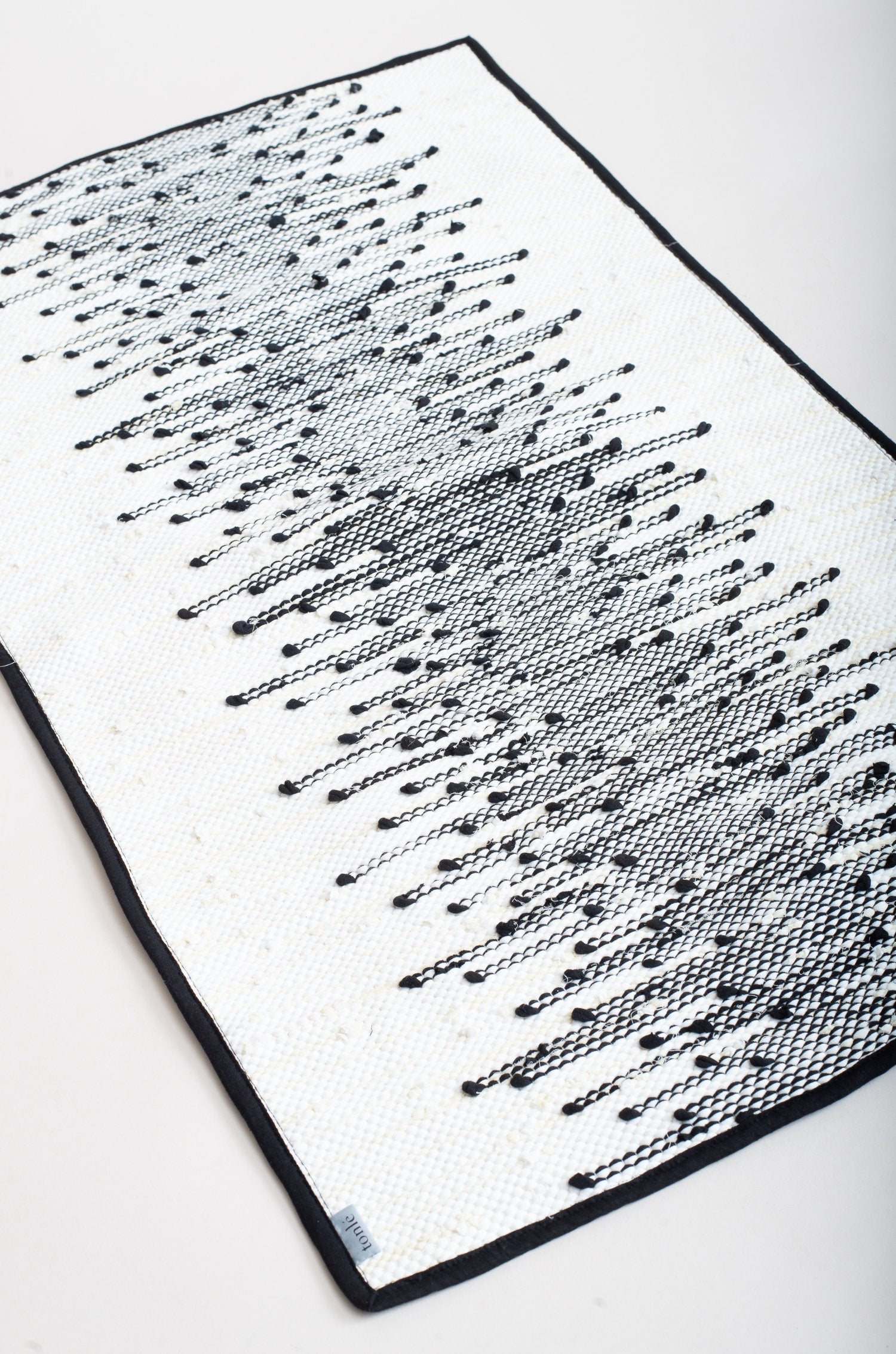 piseth handwoven rug - black and white tones