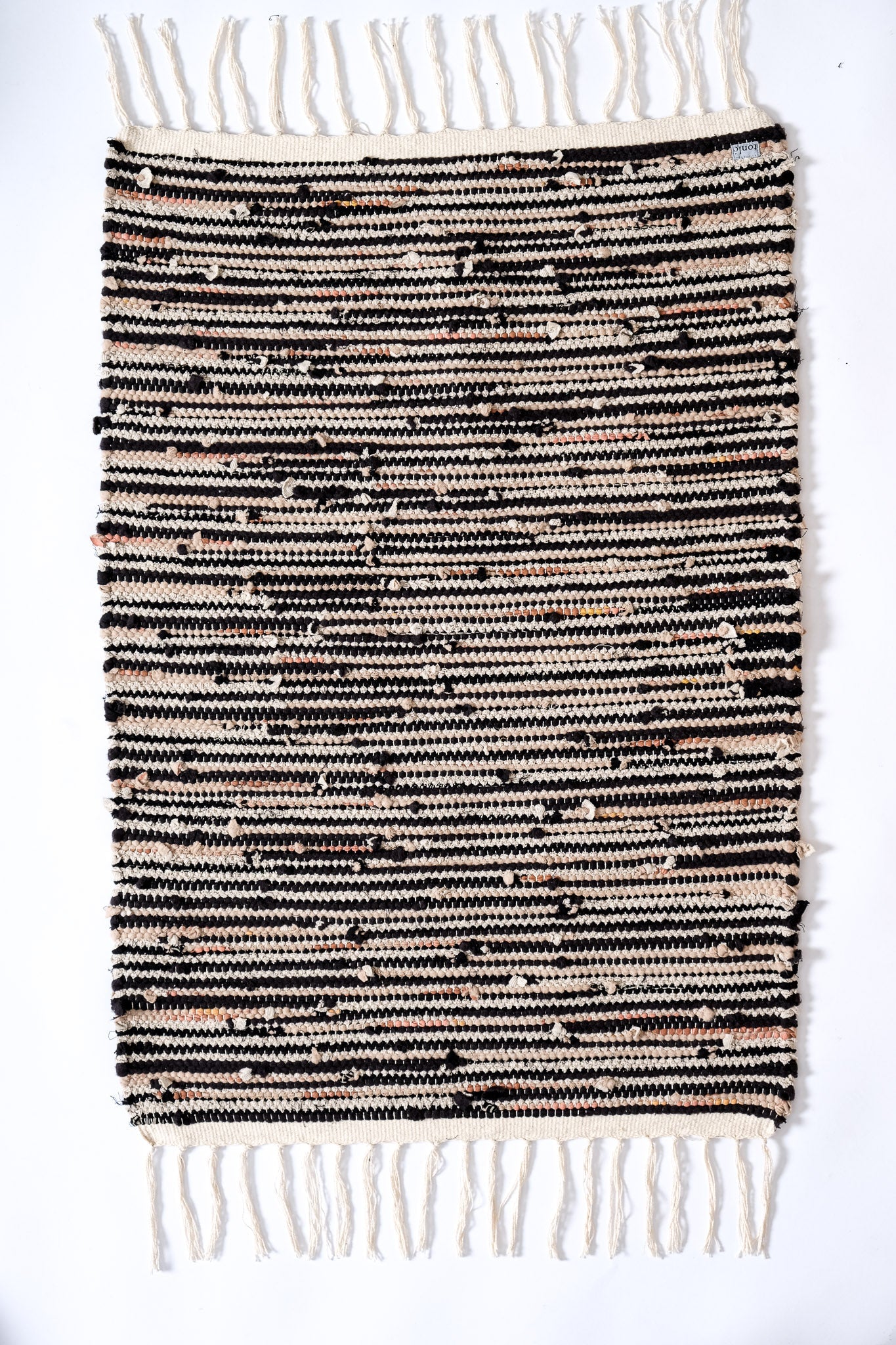 nimol handwoven rug with ties - black and white tones