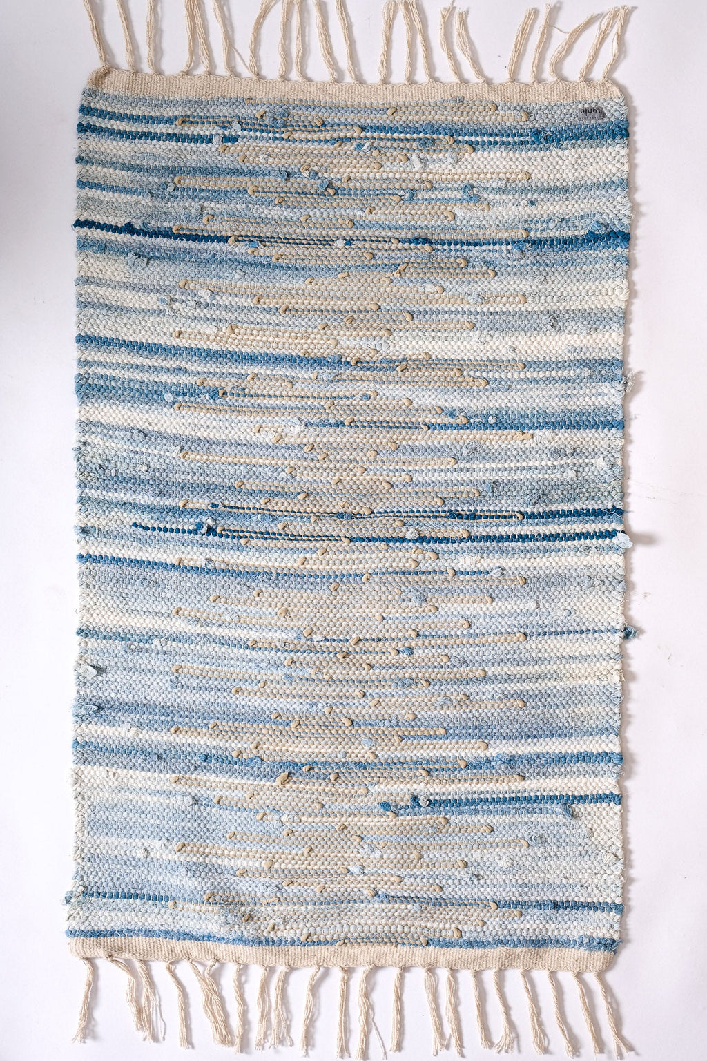 nimol handwoven rug with ties - navy and blue tones